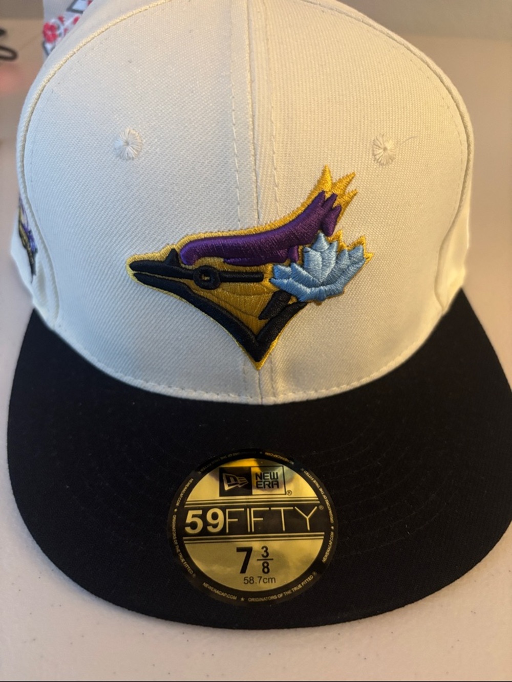 New Era 59FIFTY White & Black Fitted Hat with Multicolor Embroidered Logo